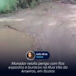 Morador relata perigo com fios expostos e buracos na Rua Vila da Aroeiras, em Búzios